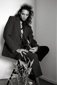 suit by Matthew Miller, neck tie by Scenery Label, neck chain by Jacey Withers, necklace by Scenery Label, rings by ASOS, shoes by Underground
