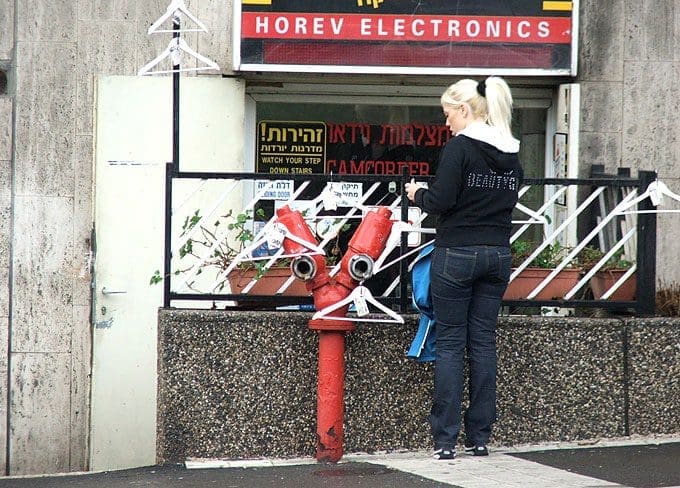 Artists should use postcards and embrace the idea of guerrilla marketing