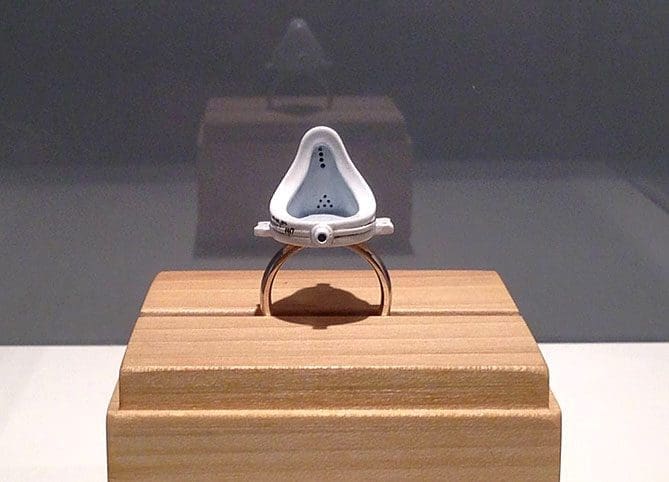 Duchamp’s Ring by Mike Chavez-Dawson – Buddha of the Bathroom