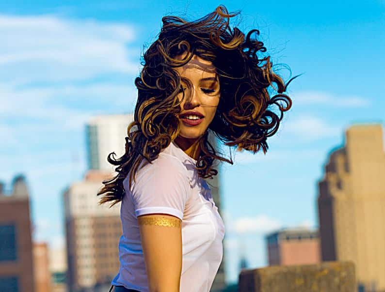 8 Tips to Grow Long and Luscious Locks: Curly Hair Edition