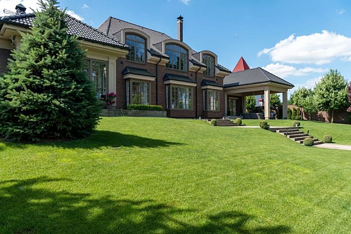 Swap Lawns for Stone Living Zones
